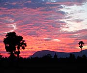 'Sunset over Bokor Mountain seen from Kampot' by Asienreisender