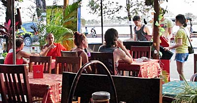 'Western Buddhist Monk in a Restaurant in Cambodia' by Asienreisender