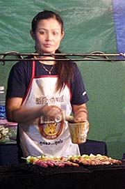 'A Food Vendor in Nong Khai' by Asienreisender