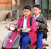 'Kids on Motorbikes' by Asienreisender