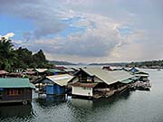 'Restaurant Boats on Khao Laem Lake' by Asienreisender