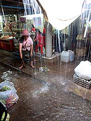 'Heavy Rain is Flooding Kampot Fresh Market' by Asienreisender