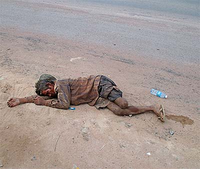 'Poor Man Lying on the Street' by Asienreisender