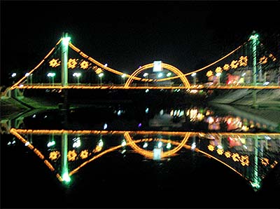 'An Illuminated Bridge over the Wang River in Lampang' by Asienreisender