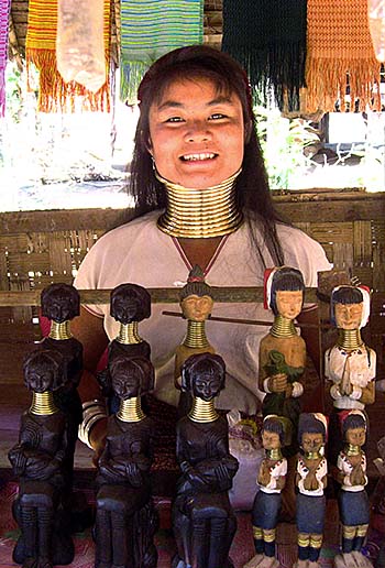 'Young Kayan Woman in a Souvenir Shop in Nai Soi' by Asienreisender